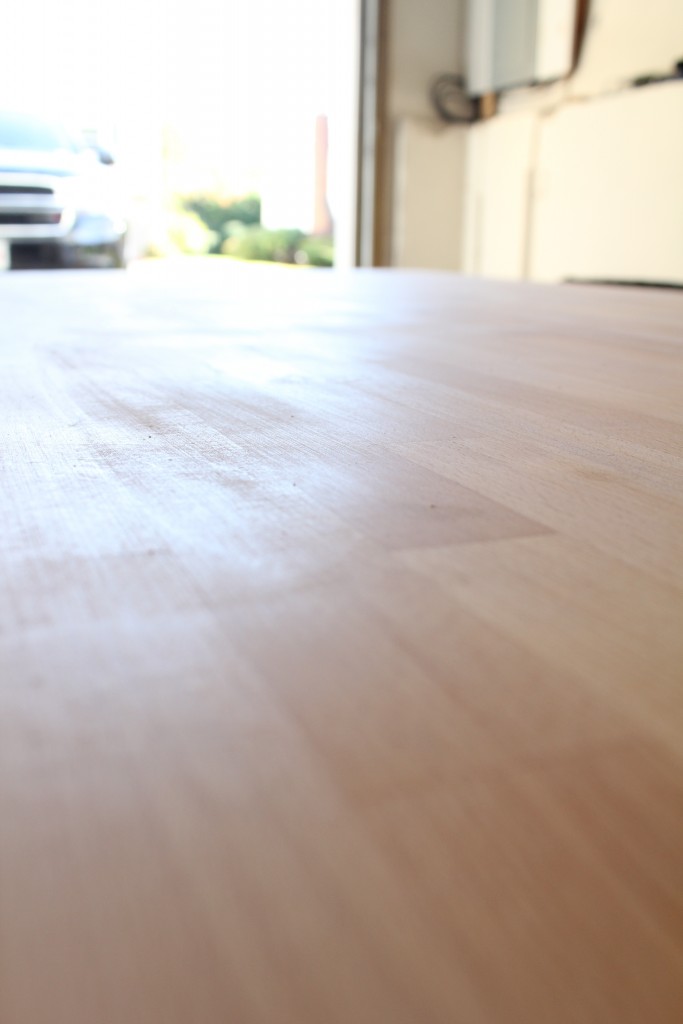 DIY dining table; stained butcher block with a metal base