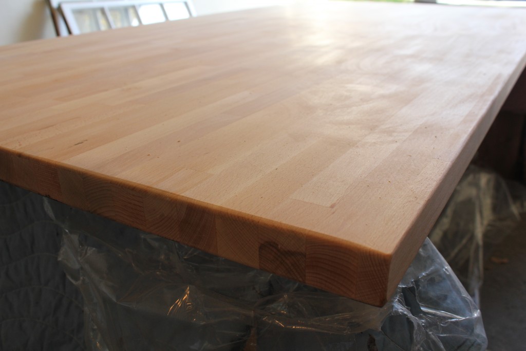 DIY dining table; stained butcher block with a metal base