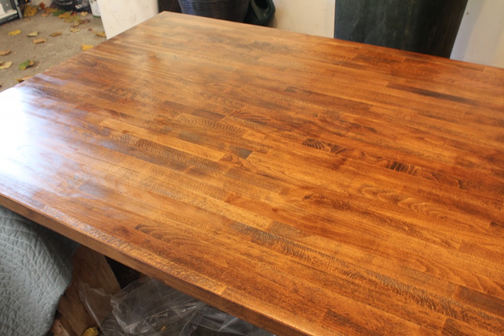 DIY dining table; stained butcher block with a metal base