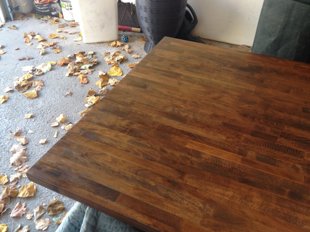 DIY dining table; stained butcher block with a metal base