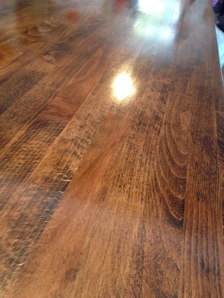 DIY dining table; stained butcher block with a metal base