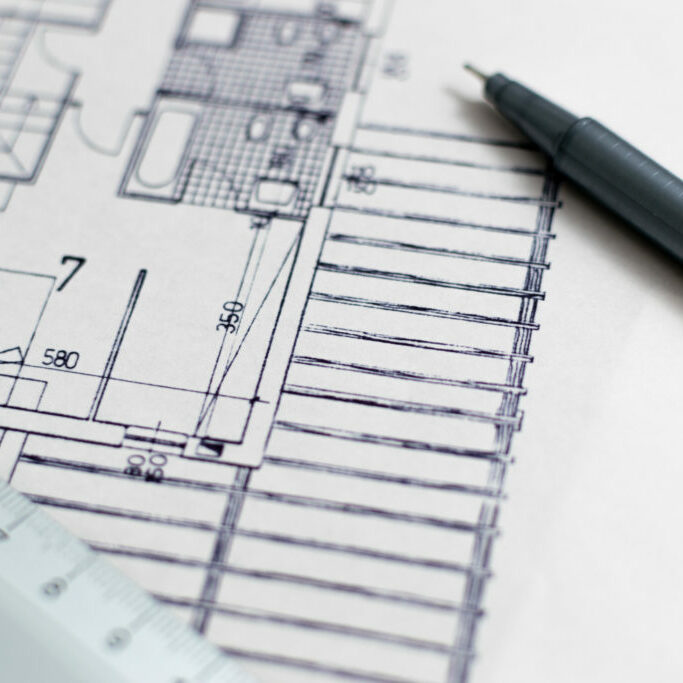Architecture blueprint with pen and ruler